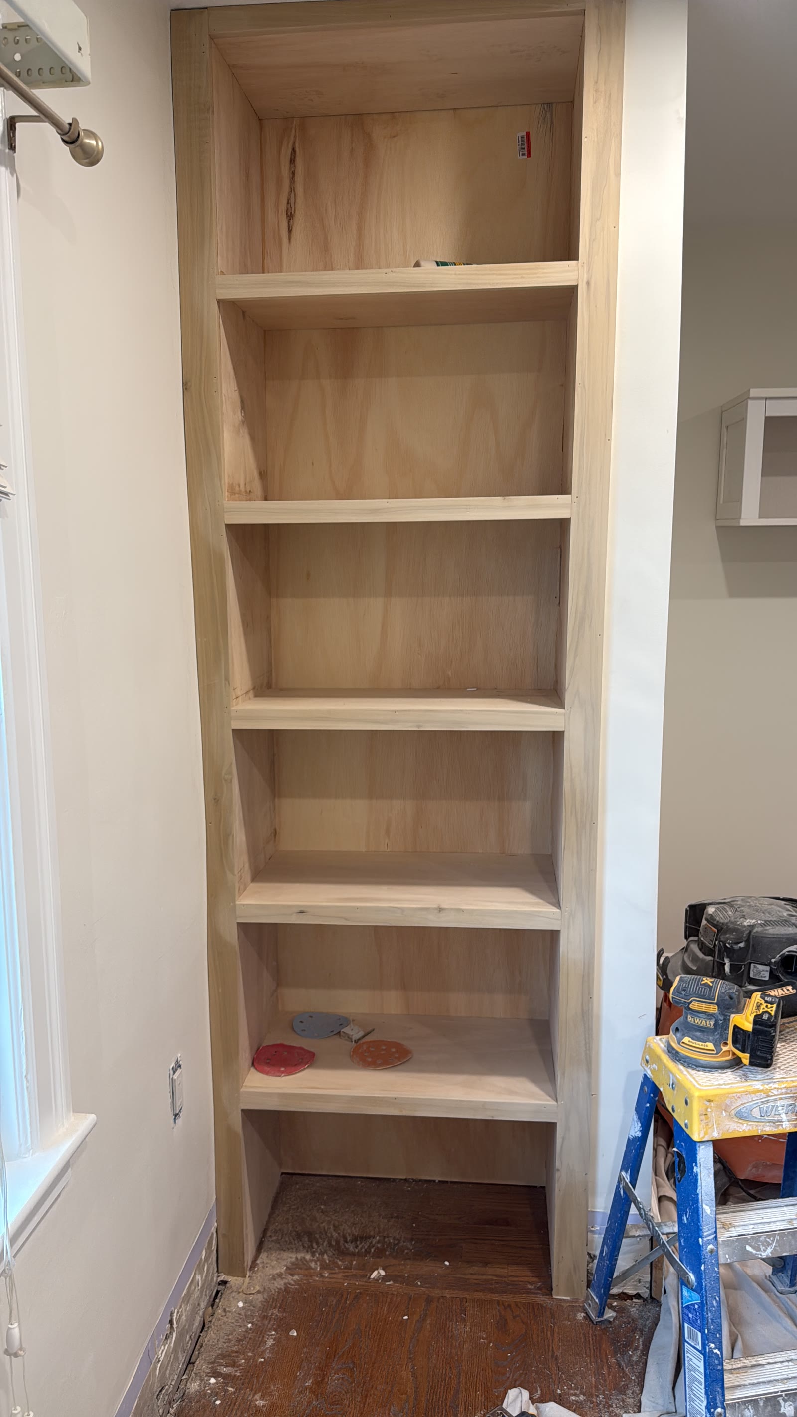 Custom built-in shelving during construction